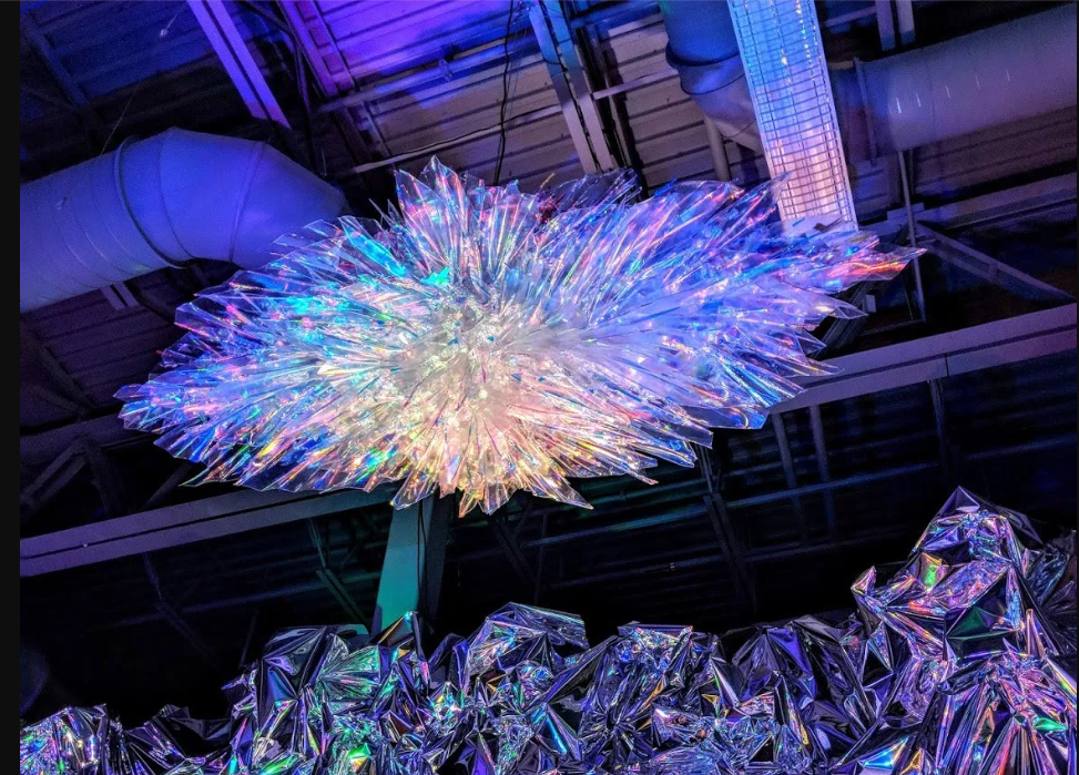 ORA (2018) by Haiiileen, immersive light sculpture at Young At Art Museum featuring reflective acrylic and LED color fields.