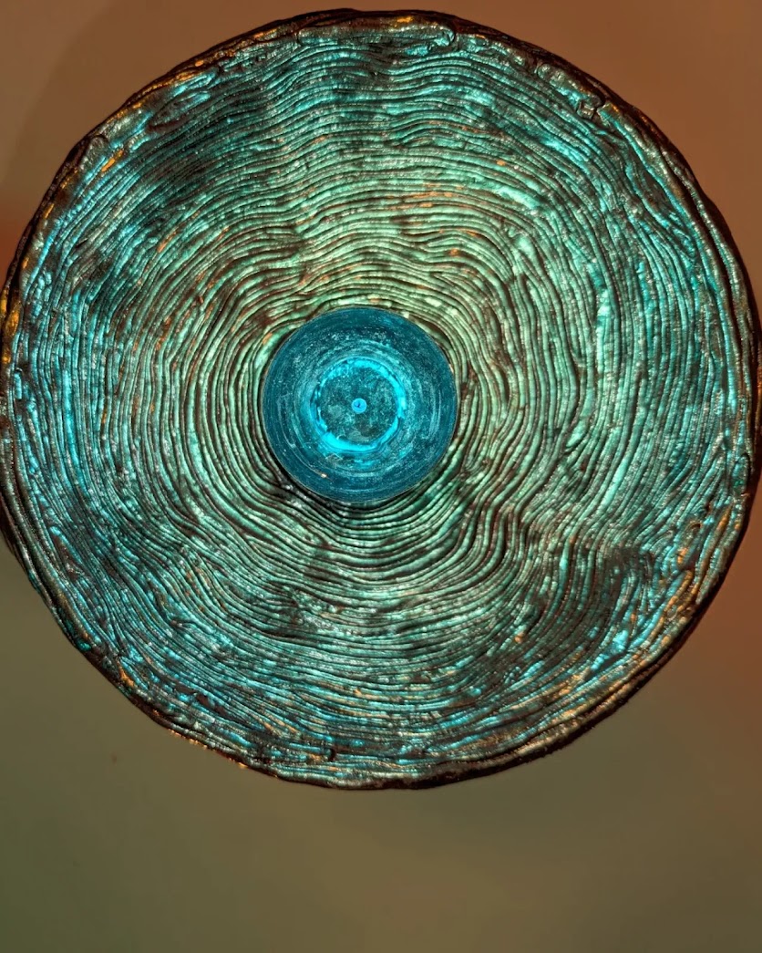 Nu-Wave Lamp by Haiiileen (2024), hand-painted prismatic glass globe with reflective metallic base.